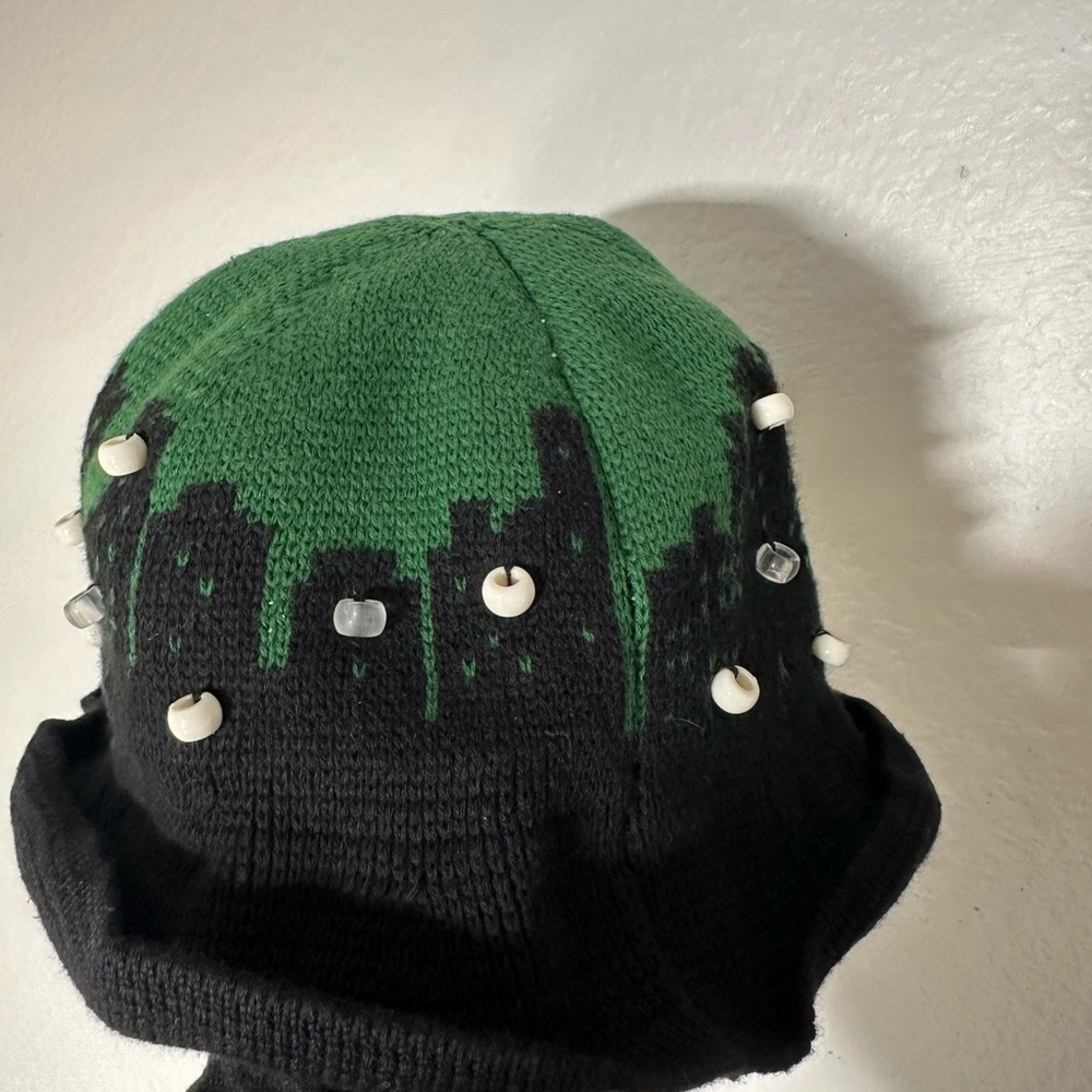 Offwhite knitted bucket hat ‘palaces’